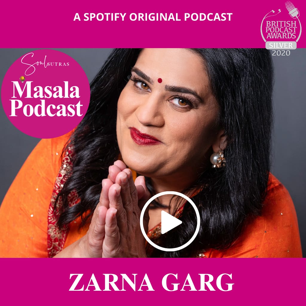 Zarna Garg US Indian comedian on Masala Podcast looks into camera with her hands folded Indian style